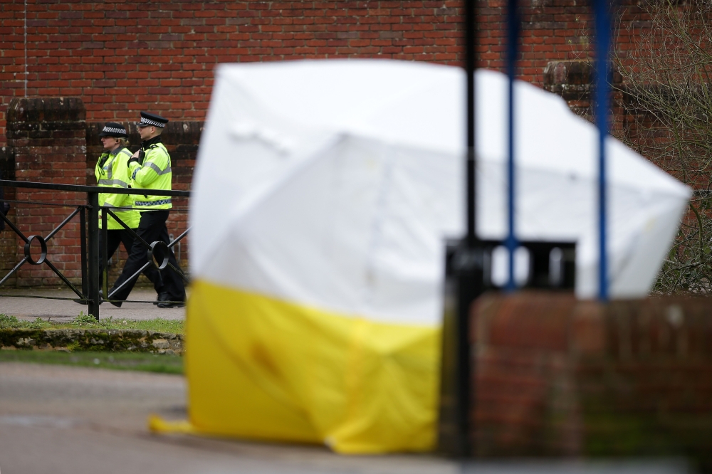 A bench covered in a protective tent is seen at The Maltings shopping centre in Salisbury, southern England, on March 15, 2018. AFP / Daniel LEAL-OLIVAS
