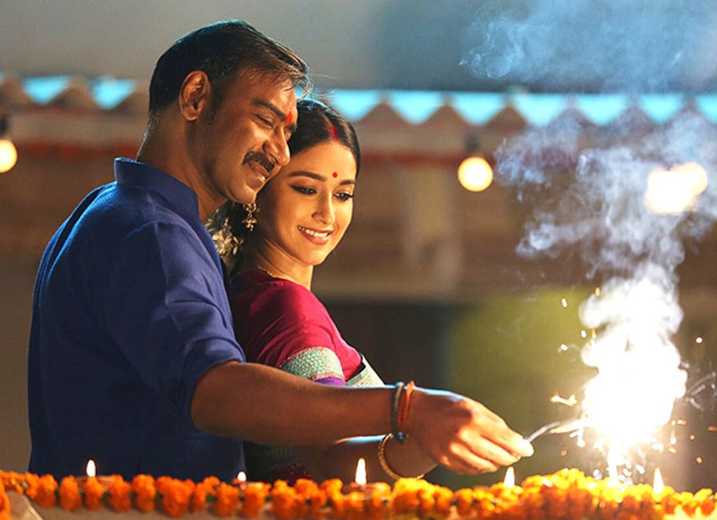 A still of the actors Ajay Devgn and Ileana D'Cruz from the movie Raid.