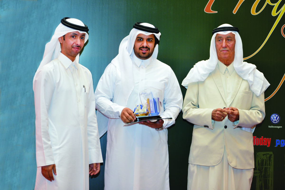 Abdulaziz Mohammed Al Sahlawi (centre), Director of Public Relations,GWC; with Faleh bin Hussein Al Hajeri (left), Director of Research and Cultural Studies at the Ministry of Culture and Sports; and Yousif bin Jassim Al Darwish, Chairman of Oryx Publishi