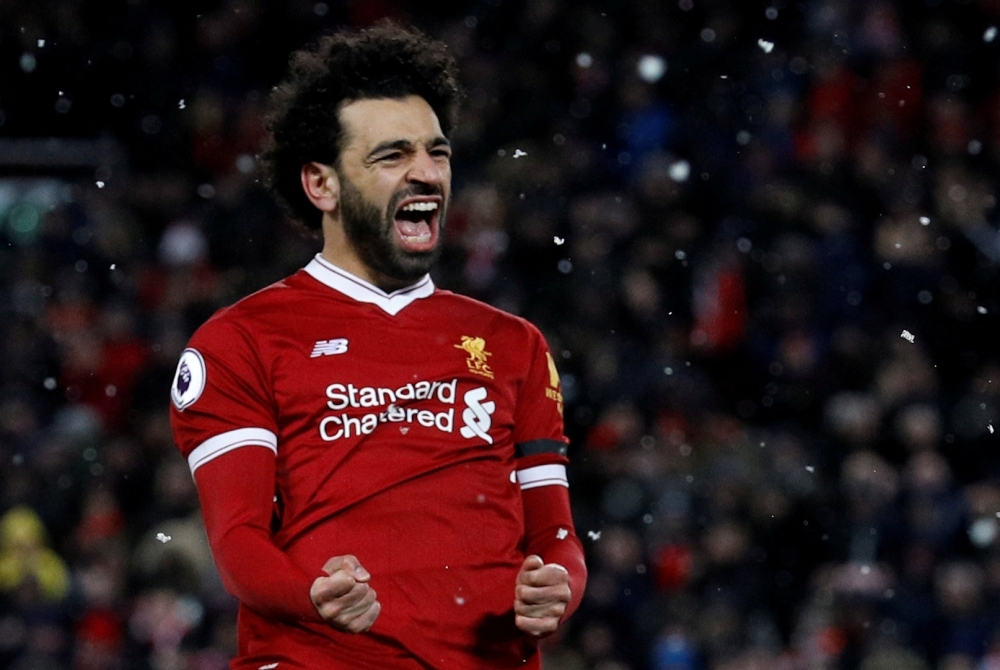 Liverpool's Mohamed Salah celebrates scoring their fourth goal REUTERS/Phil Noble 
