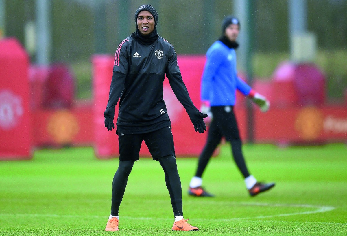 In this file photo taken on March 12, 2018 Manchester United's English midfielder Ashley Young attends a team training session at the club's training complex near Carrington, west of Manchester in north west England on March 12, 2018, on the eve of their 