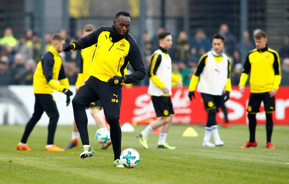 Usain Bolt participates in a training session with Borussia Dortmund - Strobelallee Training Centre, Dortmund, Germany - March 23, 2018. Reuters/Thilo Schmuelgen
