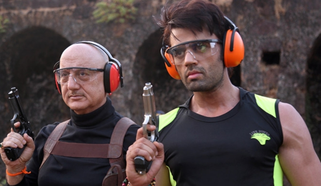 A still of the actors Anupam Kher (L) and Maniesh Paul from the movie Baa Baaa Black Sheep.