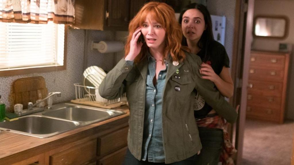 A still of the actors of Bailee Madison (R) and Christina Hendricks from the movie The Strangers: Prey At Night.