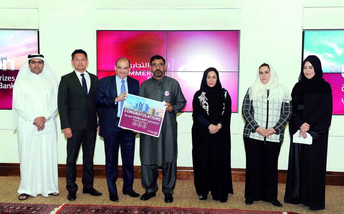 Commercial Bank officials with one of the winners of “Save & Win Campaign.” Pic: Salim Matramkot/The Peninsula