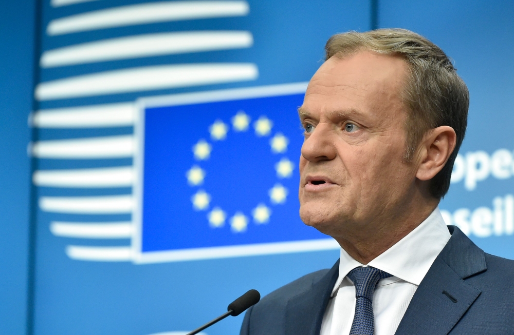 European council President Donald Tusk delivers a speech during a joint press conference on the second day of a summit of European Union (EU) leaders on March 23 2018, in Bruxelles. EU leaders on March 23 adopted negotiating guidelines for talks on the fu