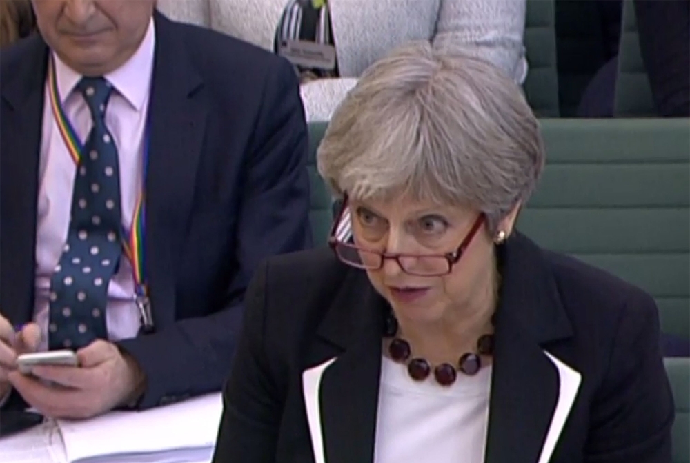 A video grab from footage broadcast by the UK Parliament's Parliamentary Recording Unit shows Britain's Prime Minister Theresa May appearing as a witness before the Liaison Committee of members of parliament at the Houses of Parliament in central London o