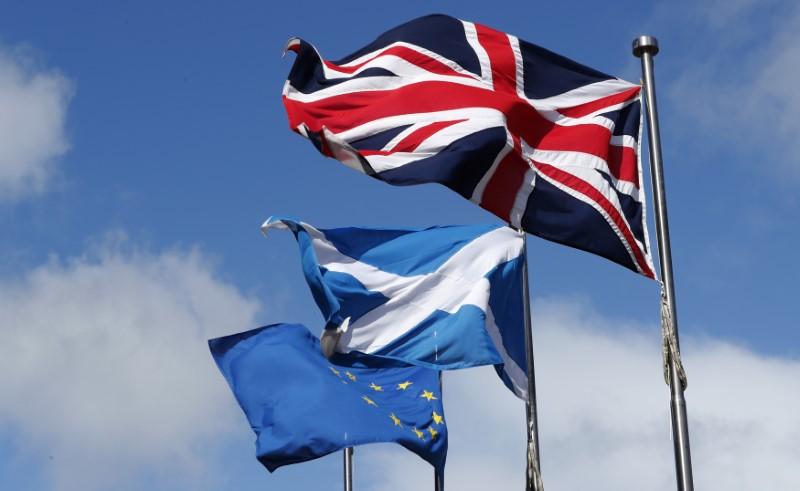 The Union flag, The Scottish Saltire and The European flag fly at the Scottish Parliament in Edinburgh, Scotland, Britain, March 21, 2017 (Reuters / Russell Cheyne) 