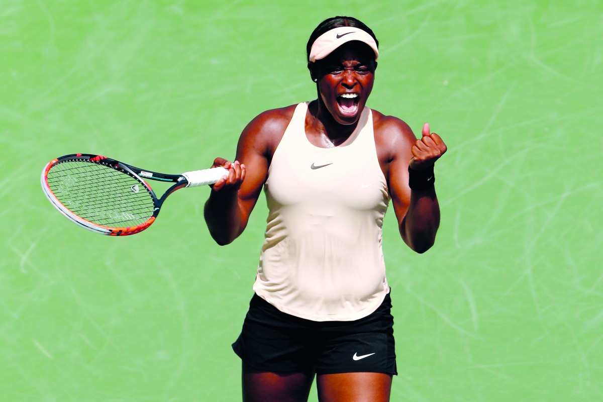 Sloane Stephens celebrates match point against Victoria Azarenka of Belarus during the semifinals of the Miami Open Presented by Itau at Crandon Park Tennis Center on March 29, 2018 in Key Biscayne, Florida. Matthew Stockman/Getty Images/AFP