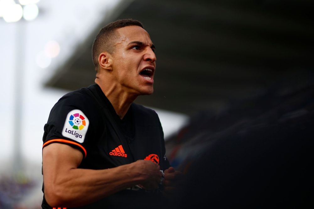 Valencia's Brazilian-Spanish forward Rodrigo Moreno celebrates after scoring a goal during the Spanish League football match between Leganes and Valencia at the Butarque stadium on April 1, 2018. / AFP / Benjamin CREMEL