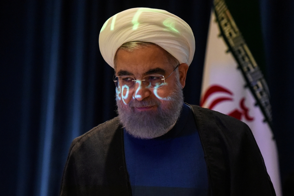 File photo of a video projection seen on the face of Iran's President Hassan Rouhani as he arrives for a news conference during the United Nations General Assembly in New York City, US September 20, 2017. REUTERS/Stephanie Keith/File Photo