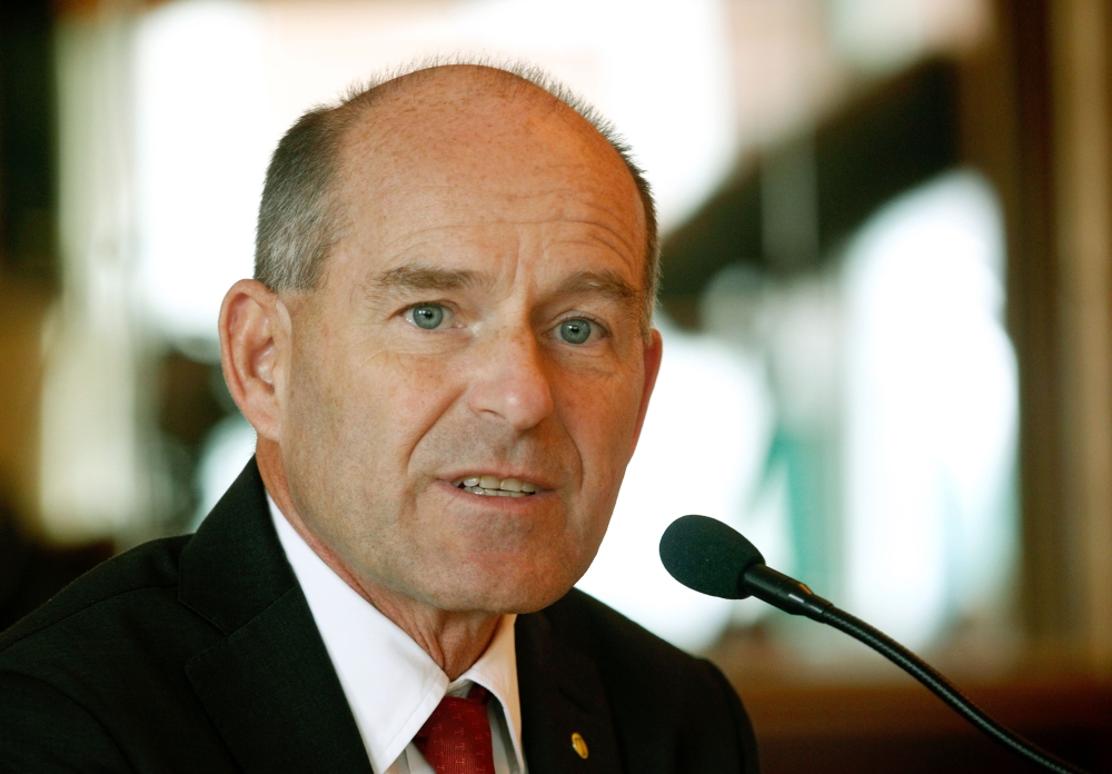 Picture taken on October 7, 2014 shows Karl-Erivan Haub, billionaire chief of Germany's sprawling Tengelmann retail group, during a press conference in Muelheim an der Ruhr, western Germany.   AFP / Roland Weihrauch
