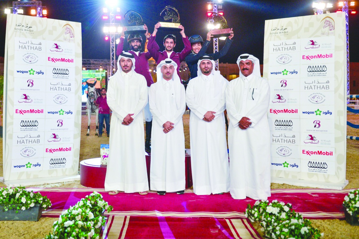 The podium winners of 130/140cm class along with officials pose for a group photo yesterday. 