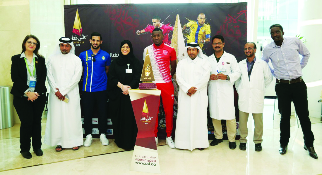 Hamad Medical Corporation  (HMC) officials and employees during the Qatar Cup Trophy Tour to HMC yesterday.
