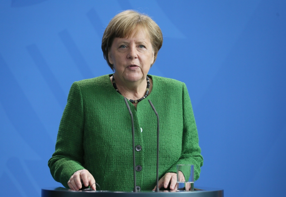German Chancellor Angela Merkel and Serbian President Aleksandar Vucic (not seen) hold a joint press conference prior to their meeting in Berlin, Germany on April 13, 2018. ( Cüneyt Karada? - Anadolu Agency )
