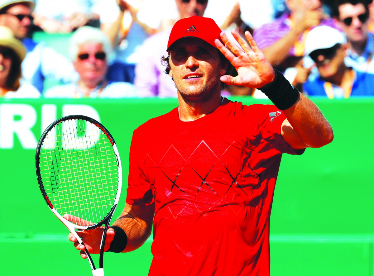 Germany’s Mischa Zverev celebrates winning his second round match against Lucas Pouille of France Reuters/Eric Gaillard