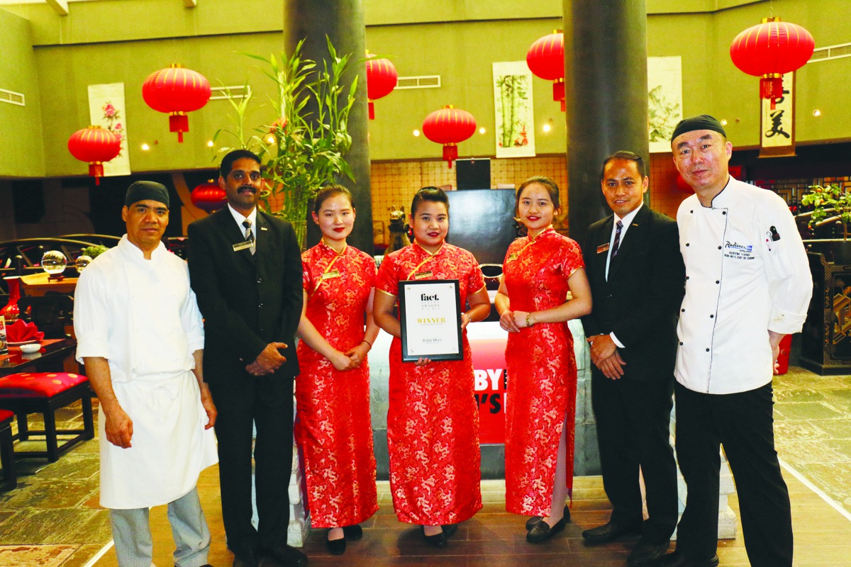 The Radisson Blu Hotel Doha staff with the award.