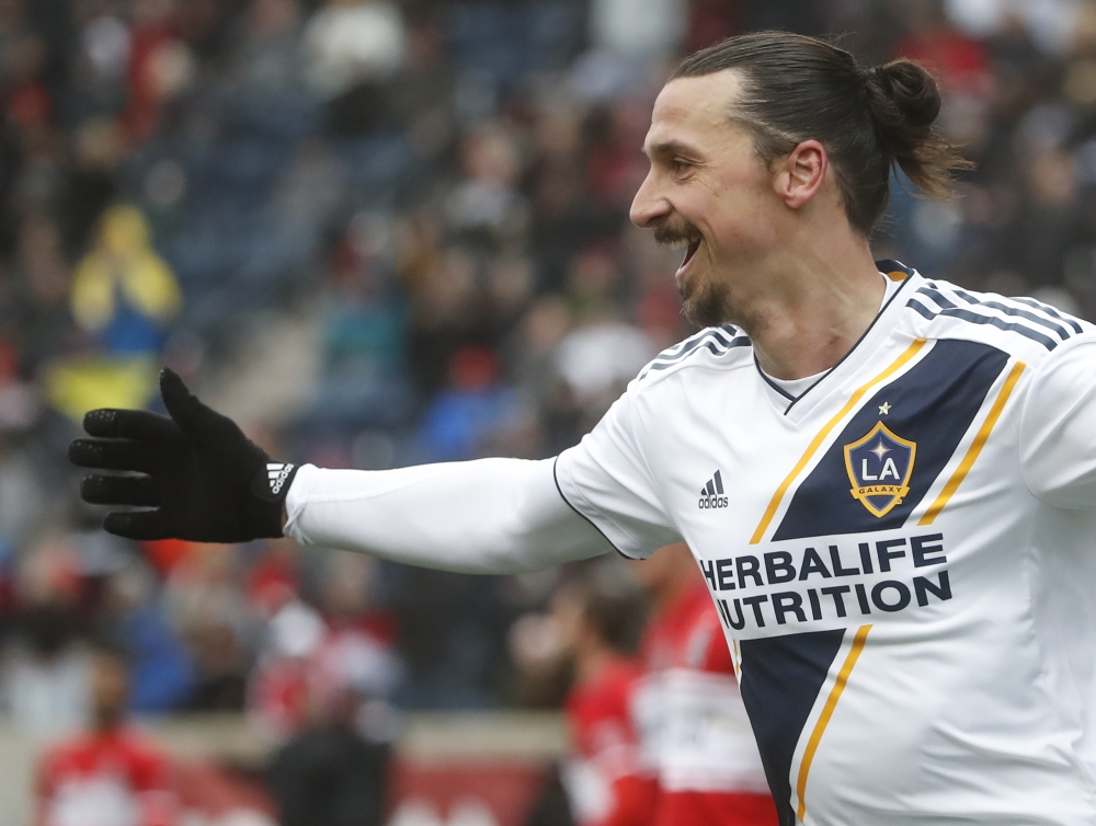 Zlatan Ibrahimovic of Los Angeles Galaxy smiles after scoring against the Chicago Fire during the first half of a MLS soccer match on April 14, 2018 at the Toyota Park in Bridgeview, Illinois. / AFP / Kamil Krzaczynski
