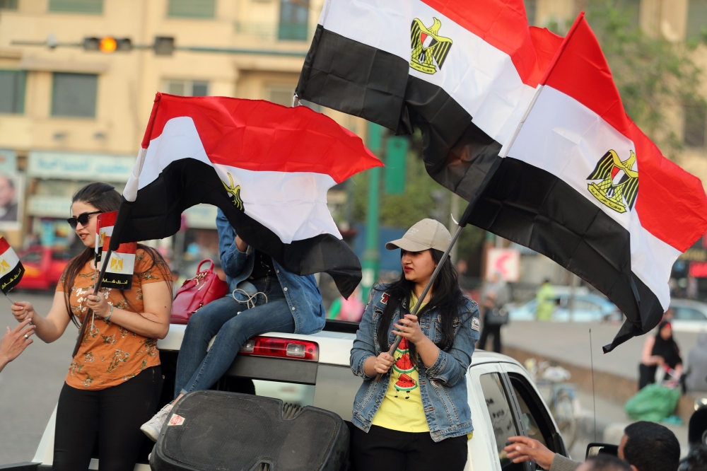 Supporters of Egyptian President Abdel Fattah al-Sisi celebrate in Tahrir square, Cairo following his re-election for a second term on April 2, 2018. (AFP / Mohamed El-Shahed) 