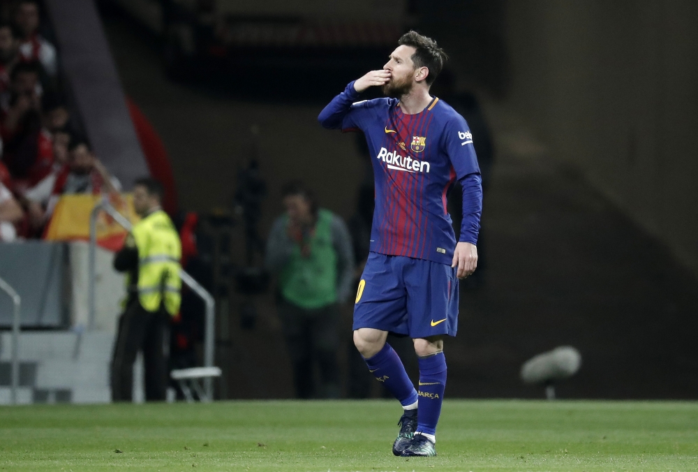 Lionel Messi of Barcelona celebrates after scoring a goal during Copa del Rey Final soccer match between Sevilla and Barcelona at Wanda Metropolitano Stadium in Madrid, Spain on April 21, 2018. Burak Akbulut - Anadolu
