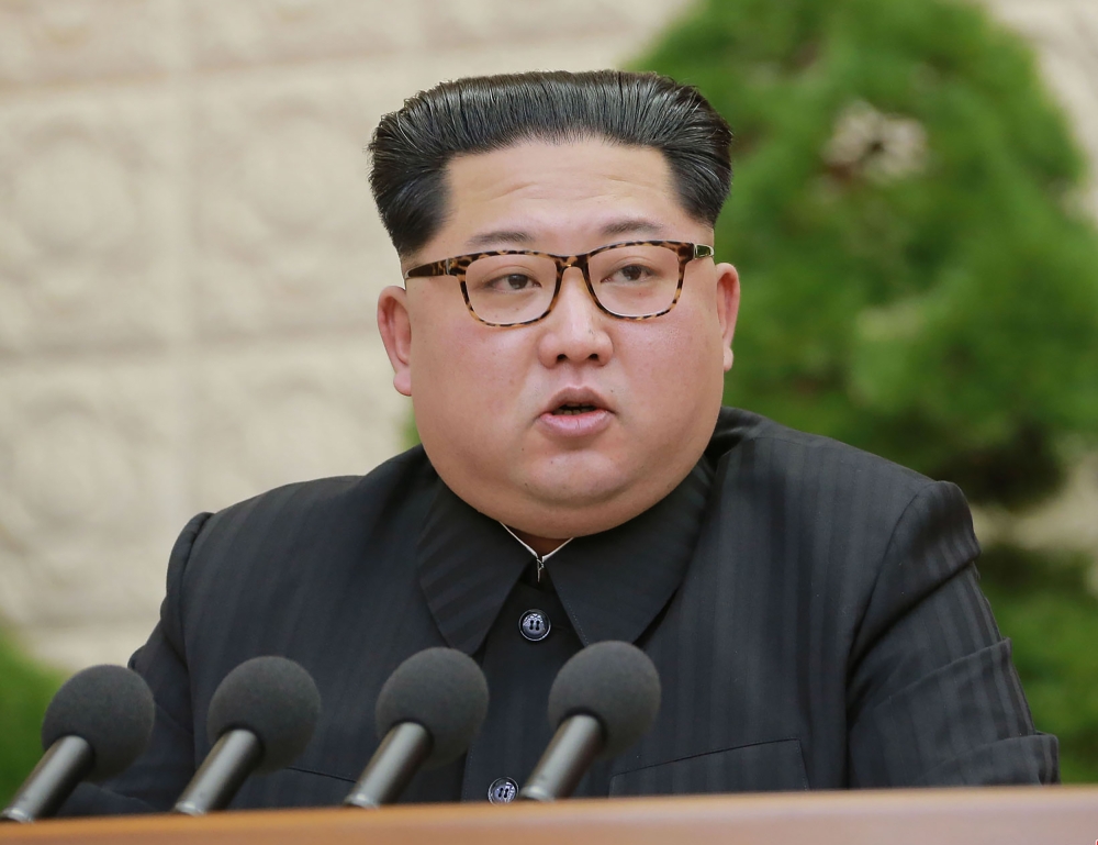 A picture released from North Korea's official Korean Central News Agency (KCNA) on April 21, 2018 shows North Korean leader Kim Jong-Un delivering a speech while attending the Third Plenary Meeting of the Seventh Central Committee of the Workers' Party o