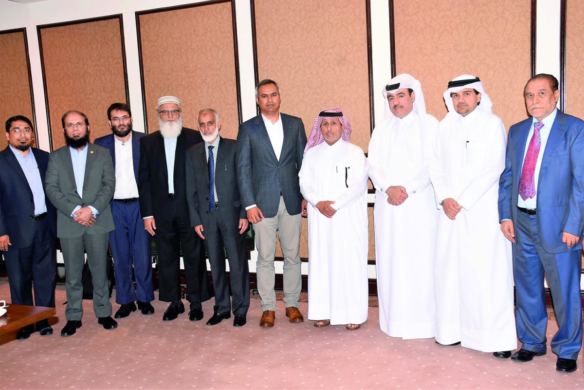 Officials posing for a group picture.