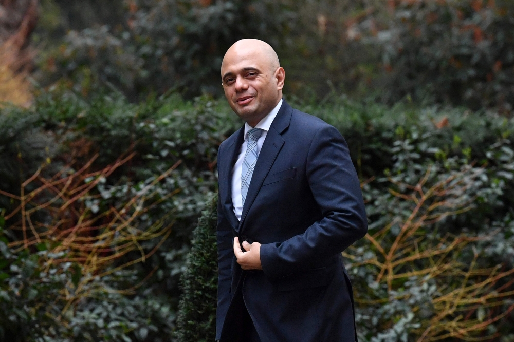 In this file photo taken on March 20, 2018 Britain's Housing, Communities and Local Government Secretary Sajid Javid leaves 10 Downing Street in central London after attending the weekly meeting of the Cabinet. (AFP / Ben STANSALL)