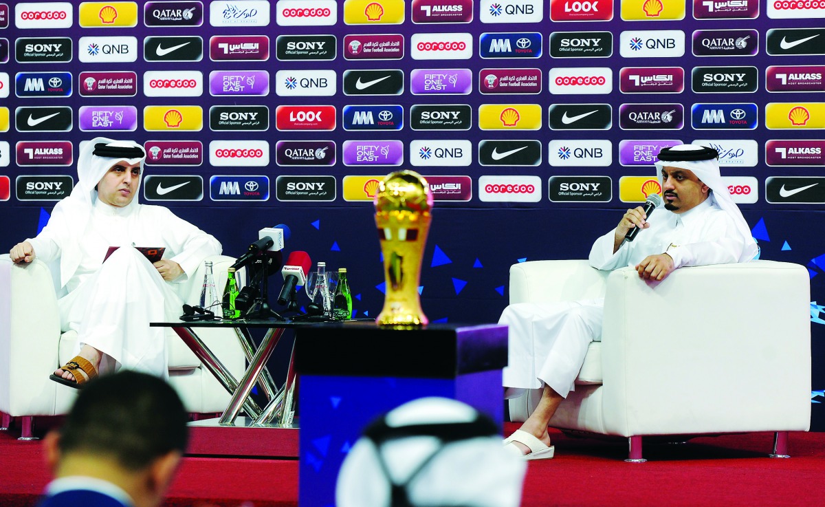 Abdullah Al Saai, Tournament Director of the 2018 Amir Cup and Abdulla Marrafi, Head of Programs Al Kass Sports channels during the launch of promotional campaigns and activities ahead of Amir Cup final, yesterday. PICS: ABDUL BASIT/THE PENINSULA