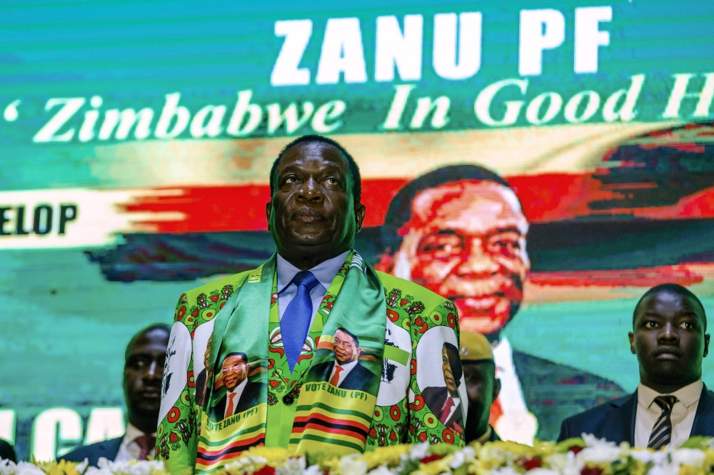 Zimbabwe ruling party Zimbabwe African National Union Patriotic Front (ZANU PF) and State President Emmerson Mnangagwa attends the official launch of the Party Manifesto for the next elections on May 4, 2018 in Harare, Zimbabwe. AFP / Jekesai NJIKIZANA