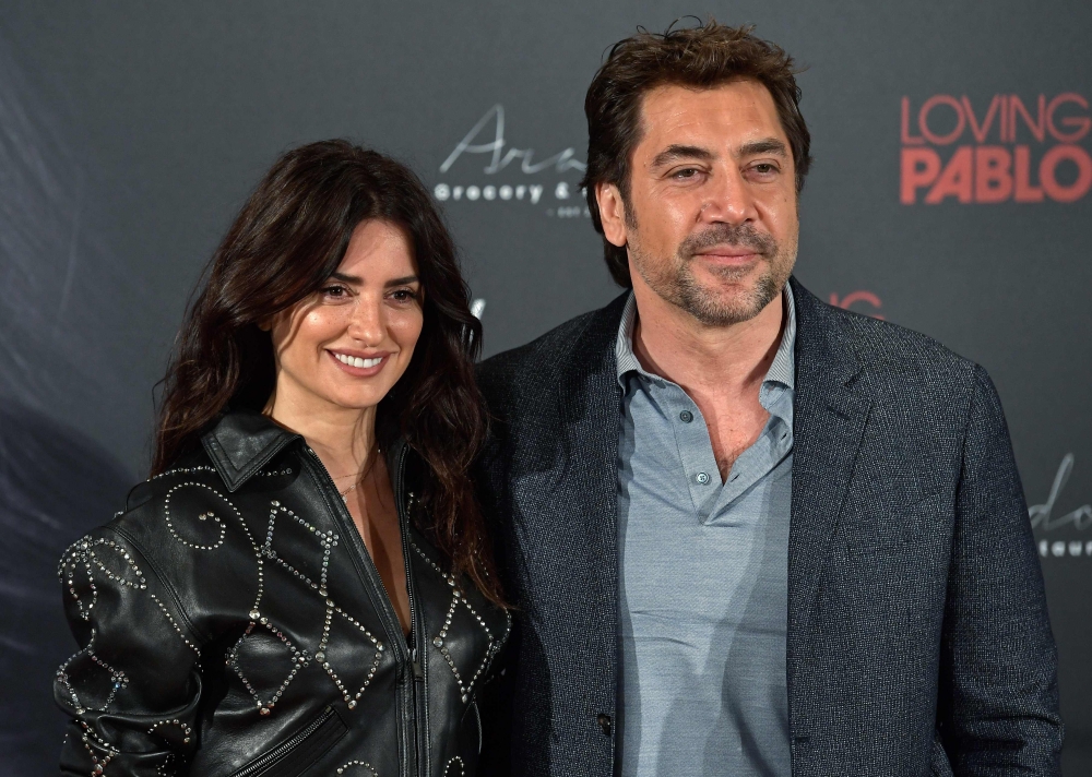 (FILES) In this file photo taken on March 06, 2018 Spanish actor and actress Javier Bardem (R) and Penelope Cruz pose during a photocall to present the film 'Loving Pablo' in Madrid. The 71st Festival de Cannes will take place from May 8 to May 19, 2018. 