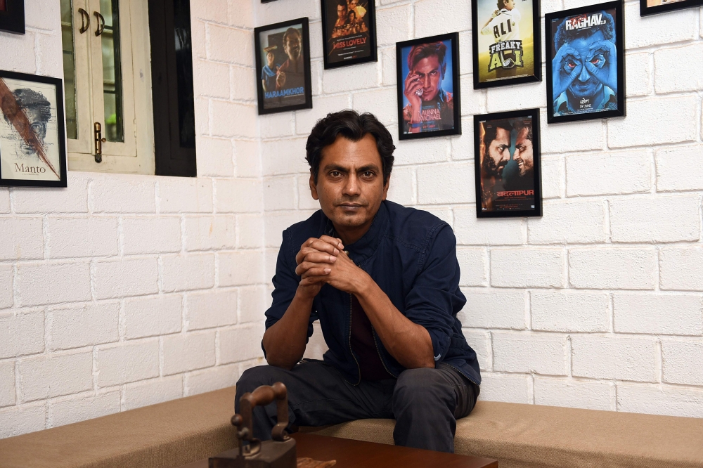 In this photo taken on May 1, 2018, Indian Bollywood actor Nawazuddin Siddiqui poses during an interview with AFP at his office in Mumbai. AFP / Sujit Jaiswal 