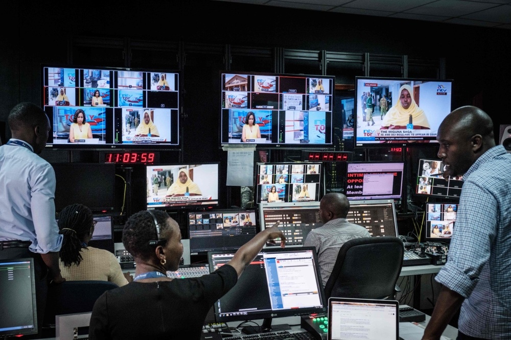 Representative image: Staff work in a control during a news program at NTV studios in Nairobi on February 6, 2018. (AFP / Yasuyoshi Chiba) 