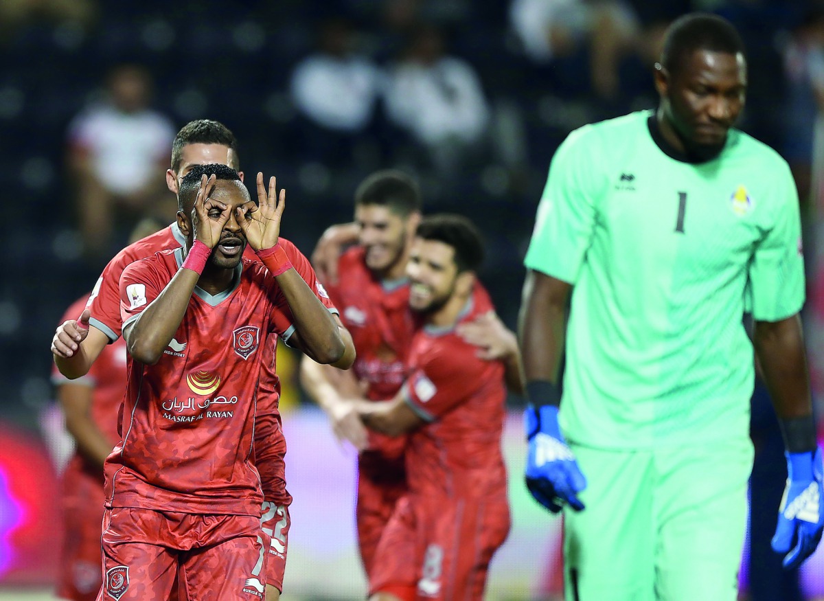 Al Duhail players celebrate after scoring in this file photo.