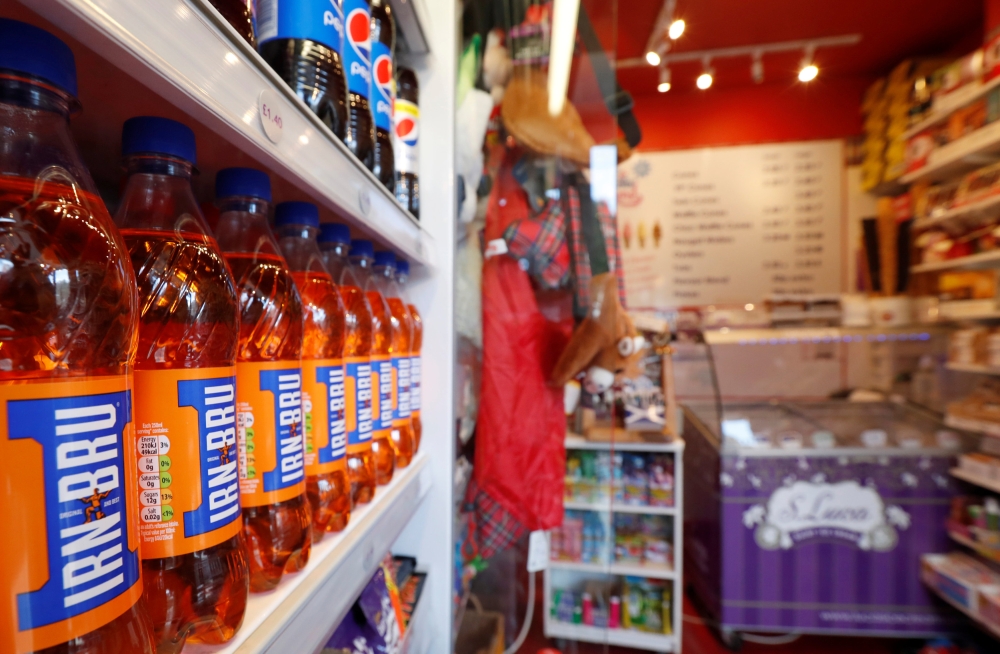 Irn Bru is seen on the shelves of Scotch Corner in Pitlochry, Scotland, Britain May 10, 2018. Reuters/Russell Cheyne 