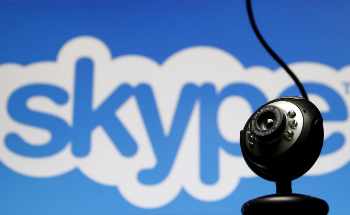 FILE PHOTO: A web camera is seen in front of a Skype logo in this photo illustration May 26, 2015. REUTERS/Dado Ruvic