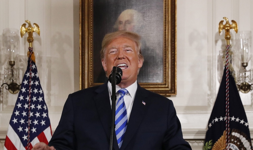 US President Donald Trump announces to withdraw from the JCPOA Iran nuclear agreement during a statement in the Diplomatic Room at the White House, May 8, 2018. (Reuters / Jonathan Ernst)
