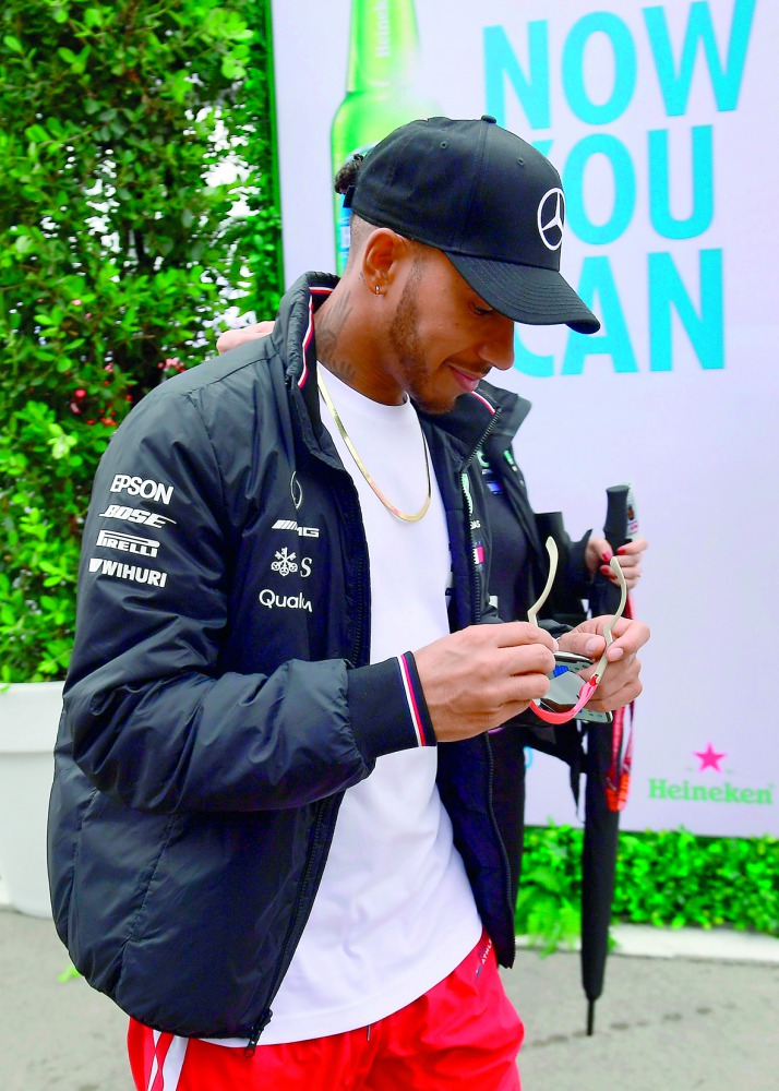 Mercedes' British driver Lewis Hamilton walks in the paddock at the Circuit de Catalunya in Montmelo in the outskirts of Barcelona on May 10, 2018 ahead of the Spanish Formula One Grand Prix. AFP / Pierre-Philippe Marcou