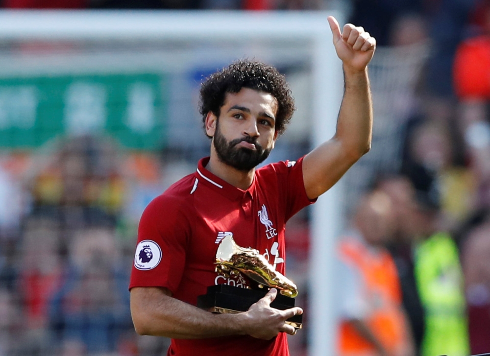Liverpool's Mohamed Salah celebrates with the Golden Boot after the match against Brighton, Anfield May 13, 2018.  Action Images via Reuters/Carl Recine