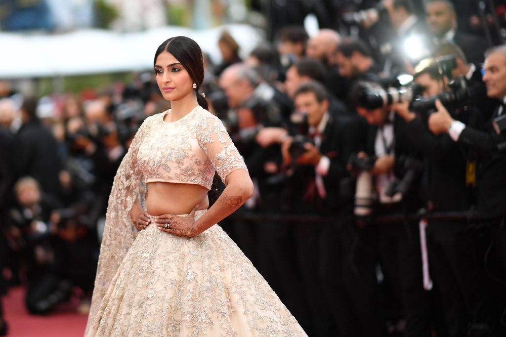 Indian actress Sonam Kapoor poses as she arrives on May 14, 2018 for the screening of the film 