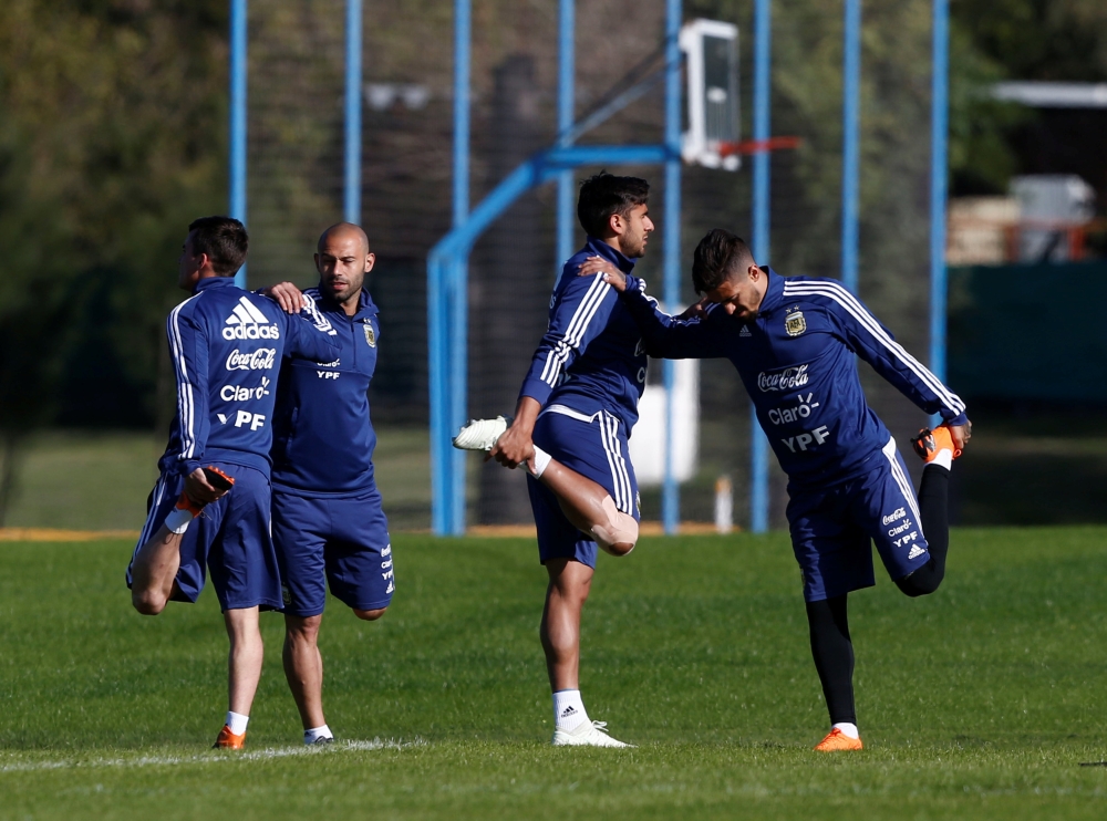 Argentine players Nicolas Tagliafico, Javier Mascherano, Eduardo Salvio and Manuel Lanzini attend a training session in preparation for World Cup 2018, Buenos Aires May 16, 2018. Reuters/Martin Acosta