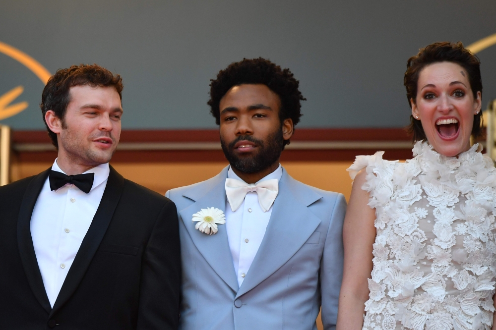 (From Left) US actor Alden Ehrenreich, US actor Donald Glover and British actress Phoebe Waller-Bridge pose as they arrive on May 15, 2018 for the screening of the film 