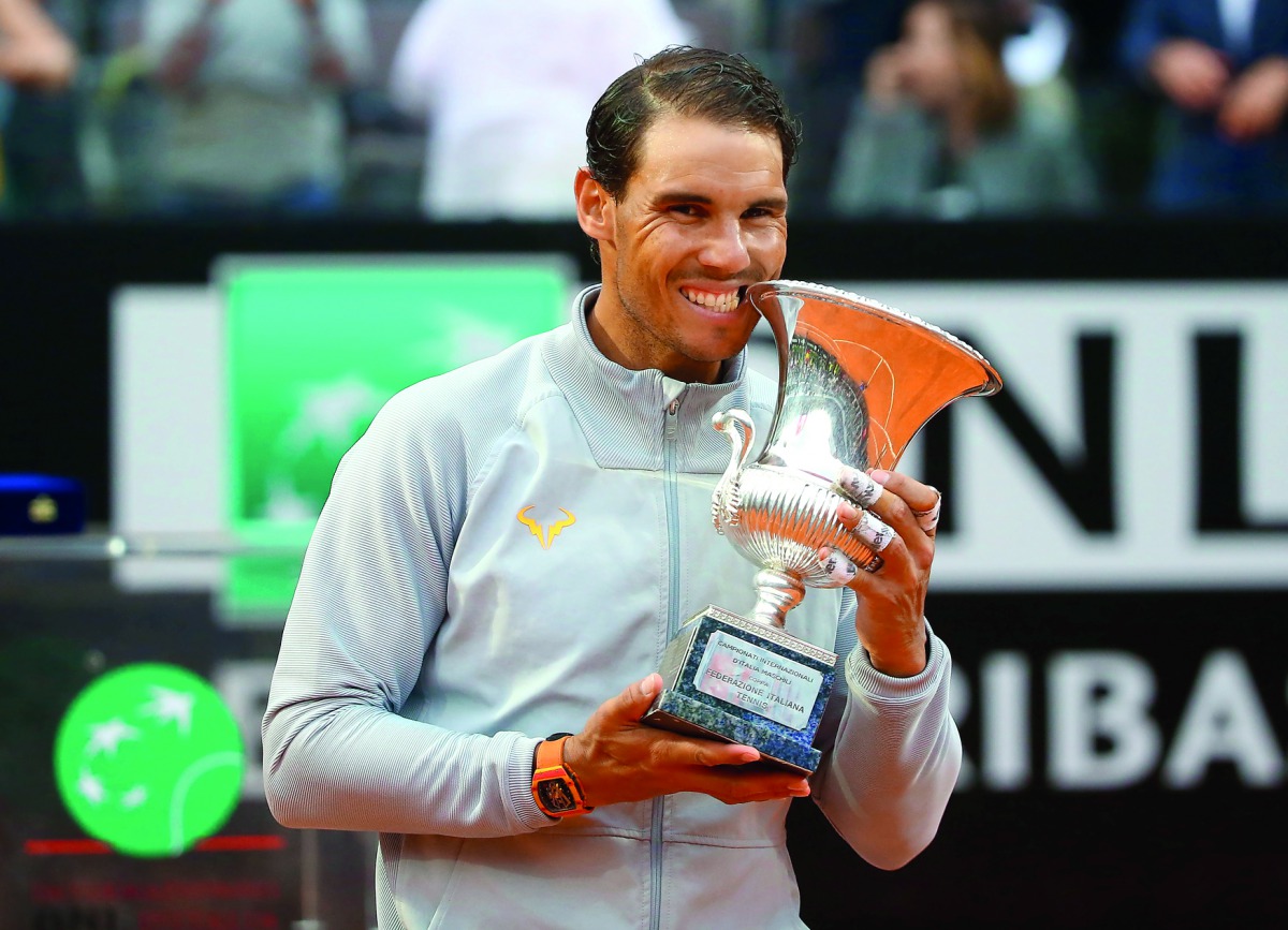 Spain's Rafael Nadal celebrates with the trophy after winning the final against Germany's Alexander Zverev. Reuters/Tony Gentile