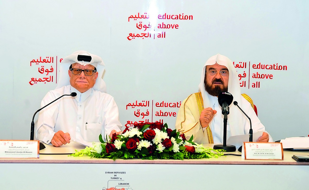 Mohammed Jassim Al Naama (left), Senior Representative of Fundraising Department at Education Above All; and Ali M Quradaghi, Secretary-General of International Union of Muslim Scholars, and Vice-Chairman for European Council for Fatwa and Research; atten
