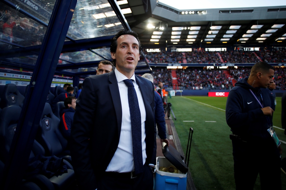In this file photo taken on May 19, 2018 Paris Saint-Germain's Spanish headcoach Unai Emery looks on before the French L1 football match between Caen (SMC) and Paris (PSG), at the Michel d'Ornano stadium, in Caen, northwestern France. / AFP / CHARLY TRIBA
