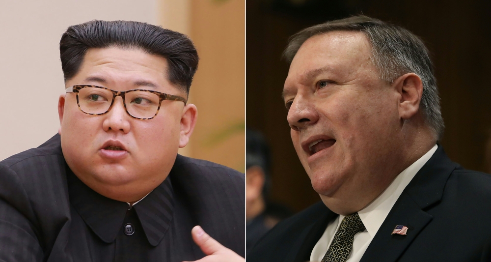 North Korean leader Kim Jong Un and US Secretary of State Mike Pompeo (KCNA via KNS & AFP/Getty Images North America/ Mark Wilson) 