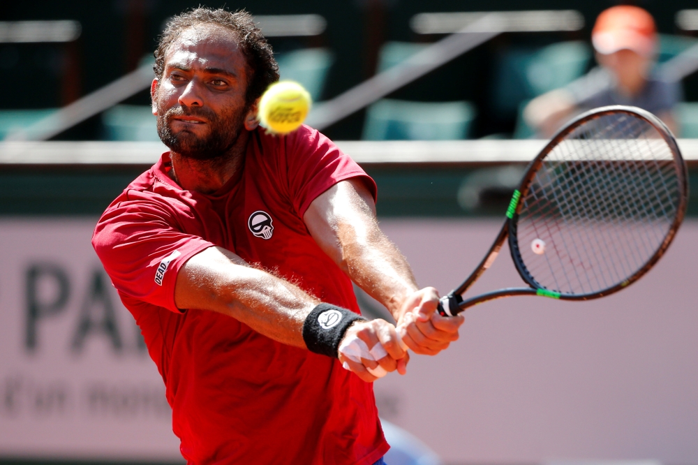 Egypt's Mohamed Safwat in action during the first round against Bulgaria's Grigor Dimitrov REUTERS/Pascal Rossignol