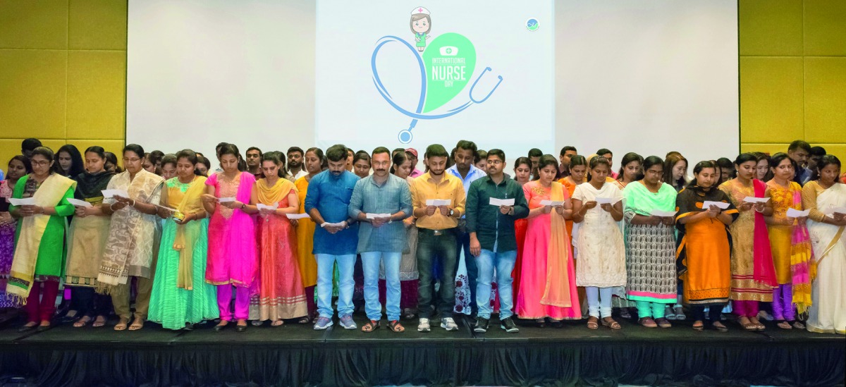 Nurses of Aster hospital and medical centres taking oath at the ceremony to mark International Nurses Day.