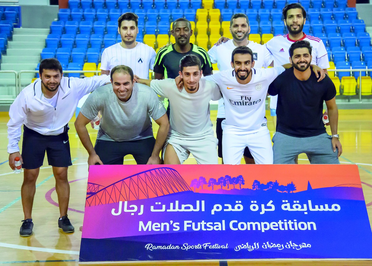 Aspire Logistics team, winners of the Aspire Zone Foundation’s (AZF) Ramadan Sports Festival (RSF) 2018 futsal competition, pose for a picture.