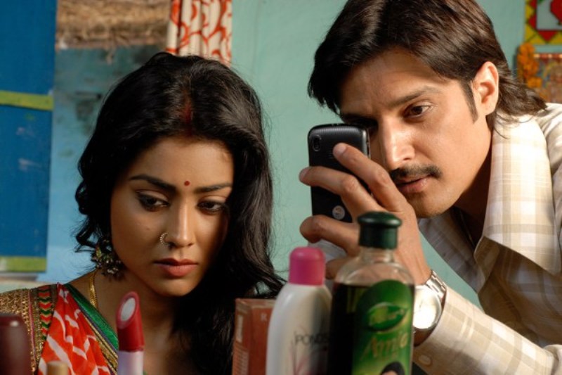 A still of the actors Jimmy Sheirgill and Shriya Saran from the movie Phamous.