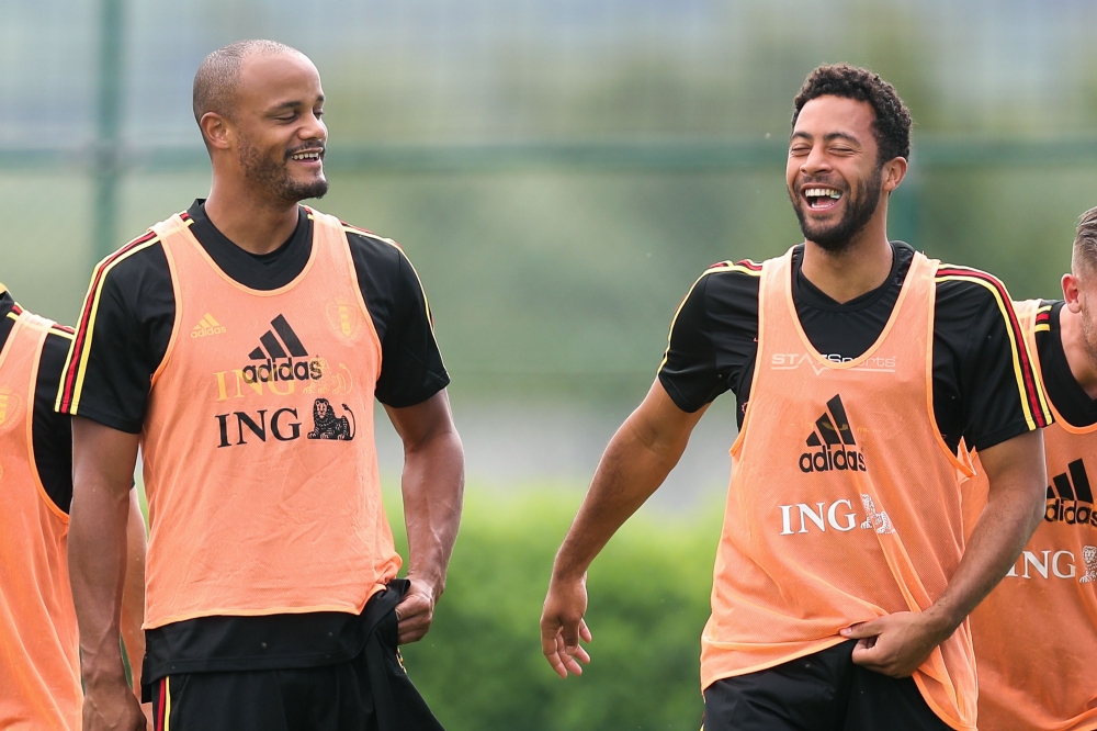 Belgium's captain and defender Vincent Kompany (L) and Belgium's midfielder Mousa Dembele attend a training session of the Belgian national football team Red Devils, in Tubize, Belgium, on May 31, 2018. AFP / BRUNO FAHY
